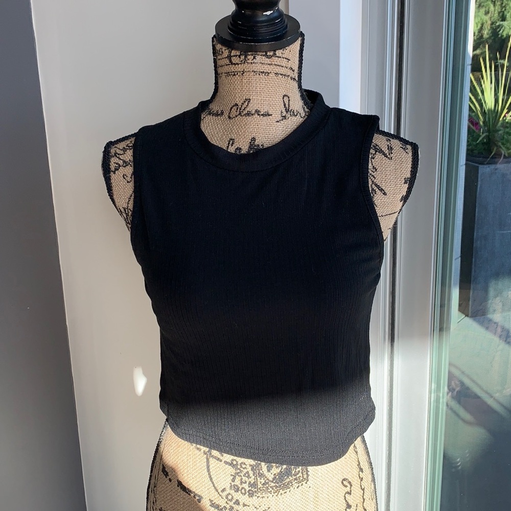 Black and white ripped tank tops sold together